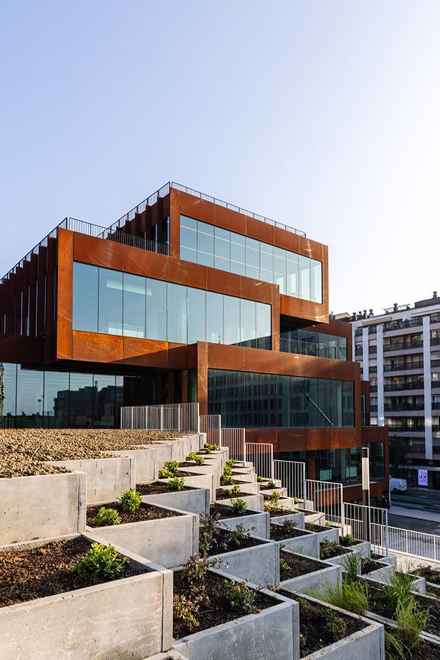 Basque Culinary Center exterior with corten surface and stepped planters