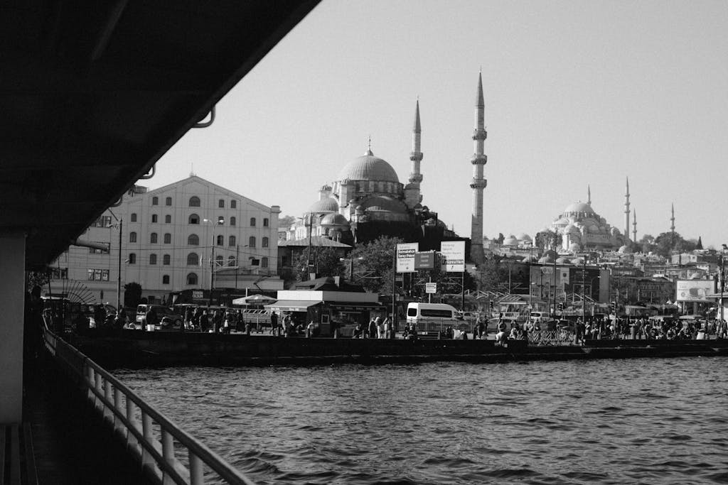 Black and white of embankment with calm sea and Hagia Sophia grand mosque on background located in Istanbul in Turkey