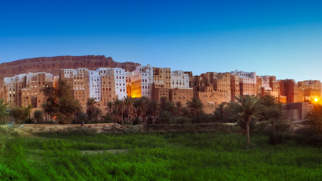 Breathtaking sunset over Shibam's historic mudbrick architecture, Yemen's 'Manhattan of the Desert.'