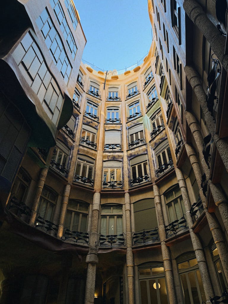 Explore the intricate design of a modernist building courtyard in Barcelona.