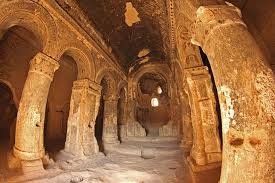 Stone-carved entrance of Derinkuyu Underground City in Cappadocia, Turkey.