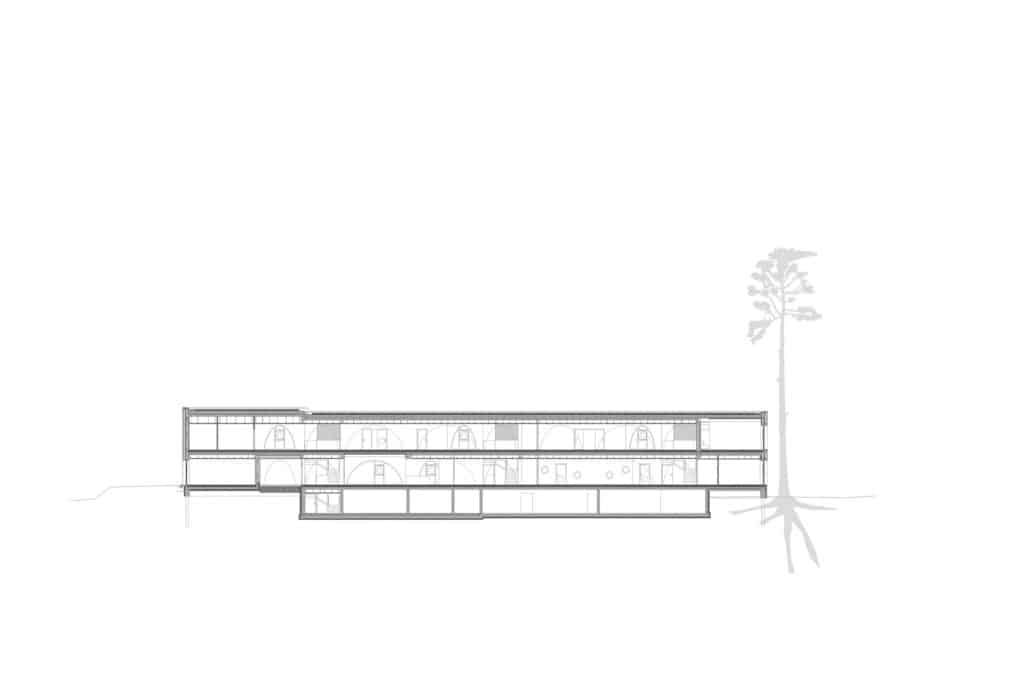 Exterior view of Allesamt Family Center with wooden fa&ccedil;ade near Nenzing train station