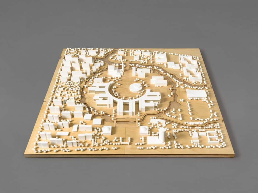 Modular academic buildings at West Lake University featuring linear structures with distinct facade patterns and colors.