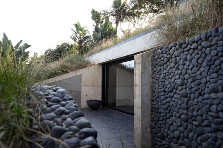 The Folly multipurpose retreat integrated into a natural hill in South Africa