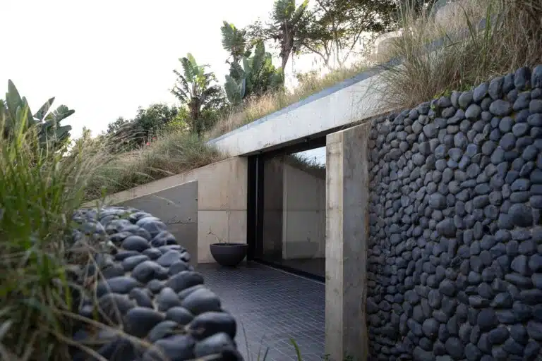 The Folly multipurpose retreat integrated into a natural hill in South Africa