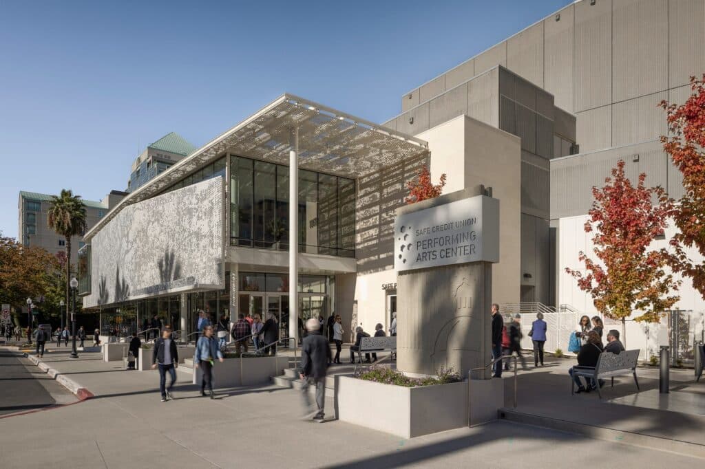 SAFE Credit Union Performing Arts Center exterior view showing renovated transparent fa&ccedil;ade and public lobbies.