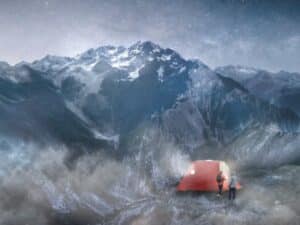 Red bivouac capsule at 2300 meters in the Italian Alps, designed for emergency shelter and cultural observation.