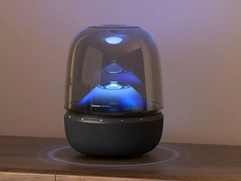 Aura Studio 5 speaker showcasing transparent dome and ambient lighting in an interior setting