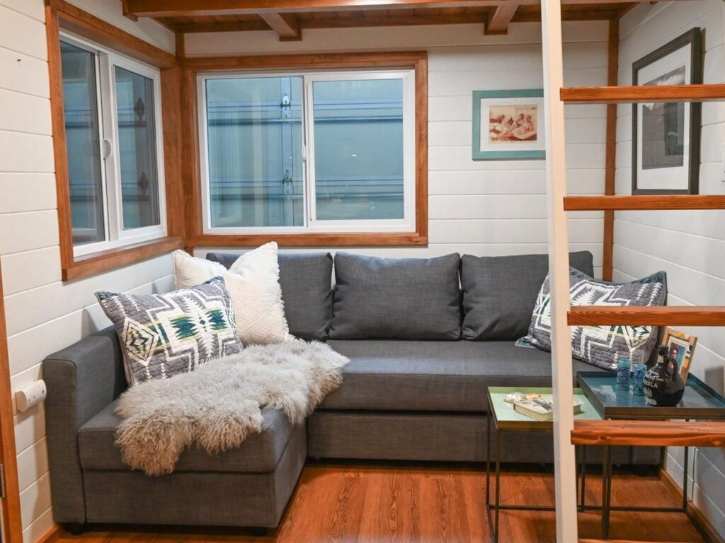 Exterior view of Big Freedom Tiny Homes showing mixed wood and metal materials