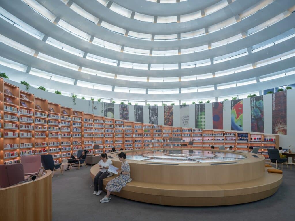 Central park of the campus with the conference hall at its heart, providing spaces for events and social interaction.