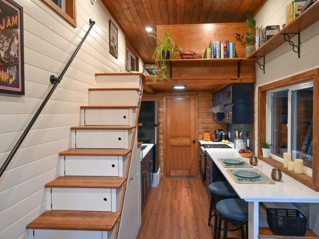 Exterior view of Big Freedom Tiny Homes showing mixed wood and metal materials