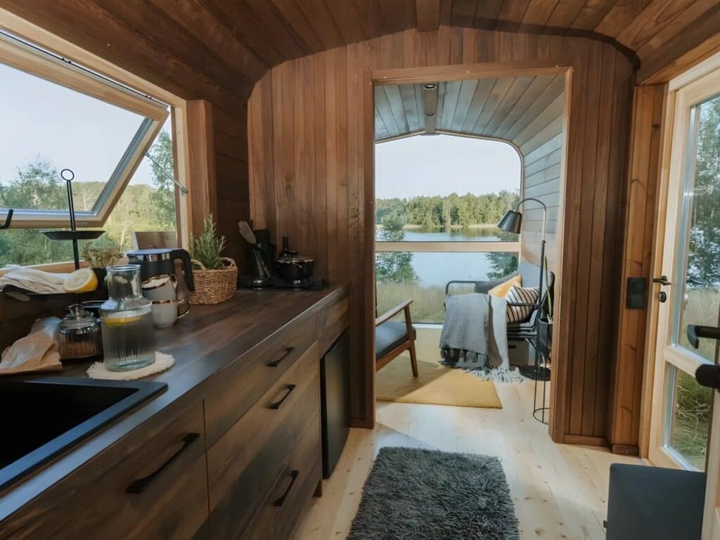 Solar panels and battery systems for off-grid energy independence in Nature Pod, highlighting sustainable small-scale living.
