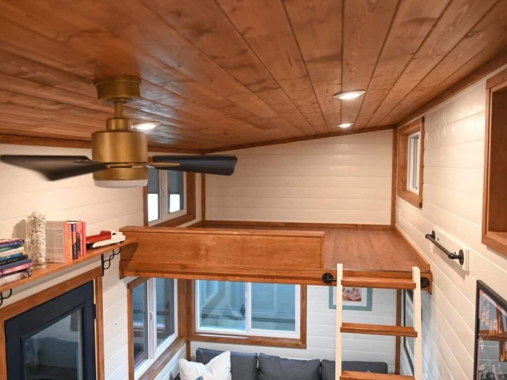 Exterior view of Big Freedom Tiny Homes showing mixed wood and metal materials
