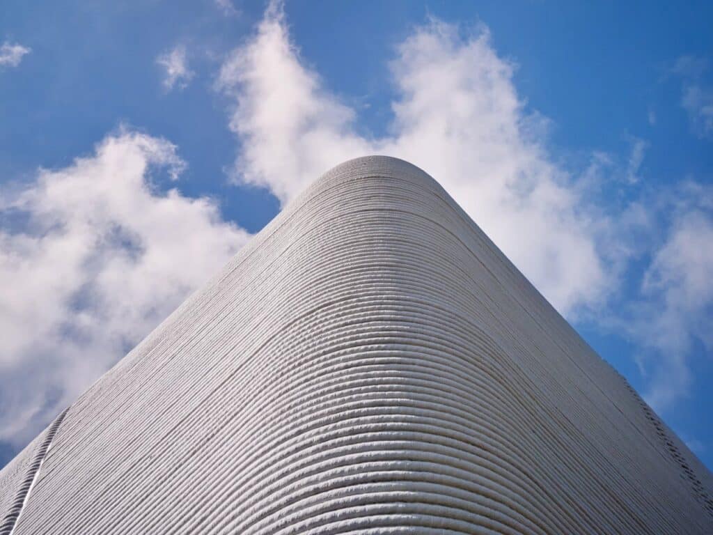 Tiny House Lux in Niederanven, Luxembourg, 3D-printed concrete residential building with sustainable design, compact urban layout, and energy-efficient features.