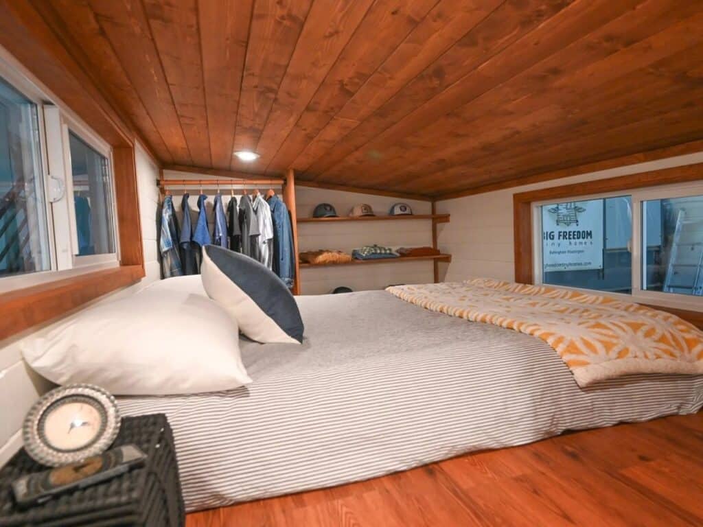 Exterior view of Big Freedom Tiny Homes showing mixed wood and metal materials