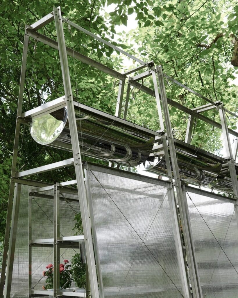 Steel A-frame structure covered with transparent polycarbonate panels