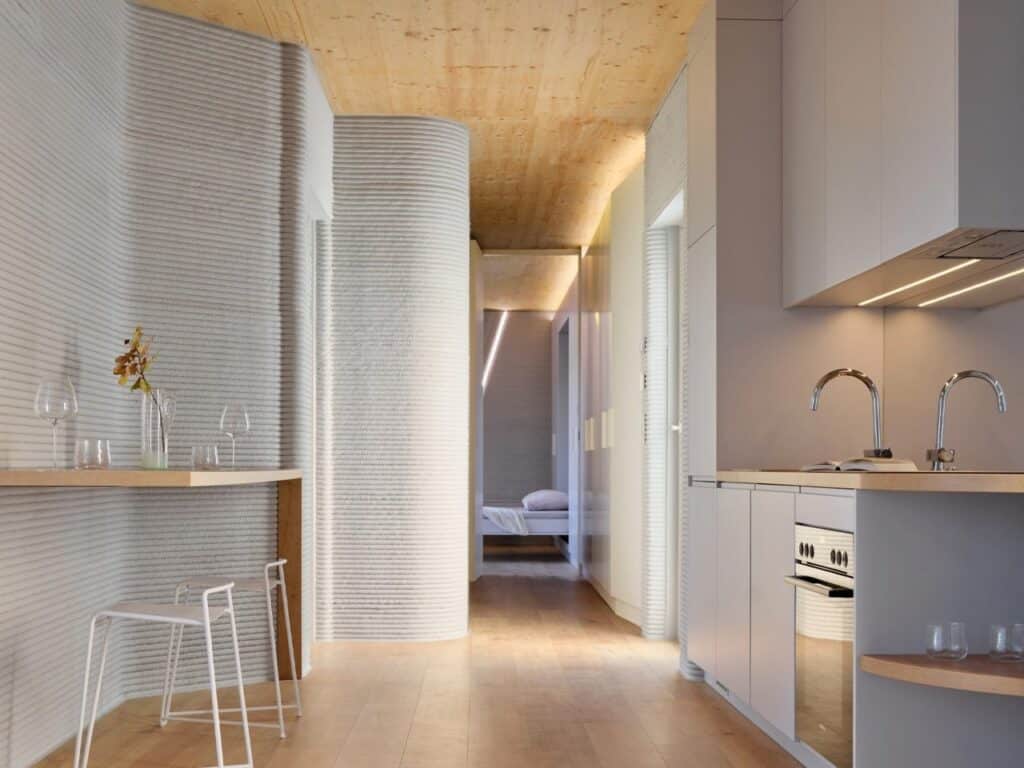 Tiny House Lux in Niederanven, Luxembourg, 3D-printed concrete residential building with sustainable design, compact urban layout, and energy-efficient features.