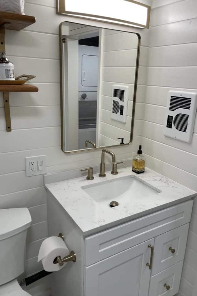 Exterior view of Big Freedom Tiny Homes showing mixed wood and metal materials