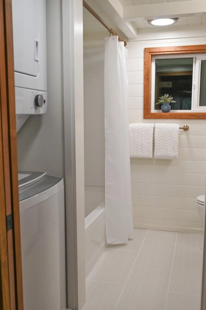 Exterior view of Big Freedom Tiny Homes showing mixed wood and metal materials