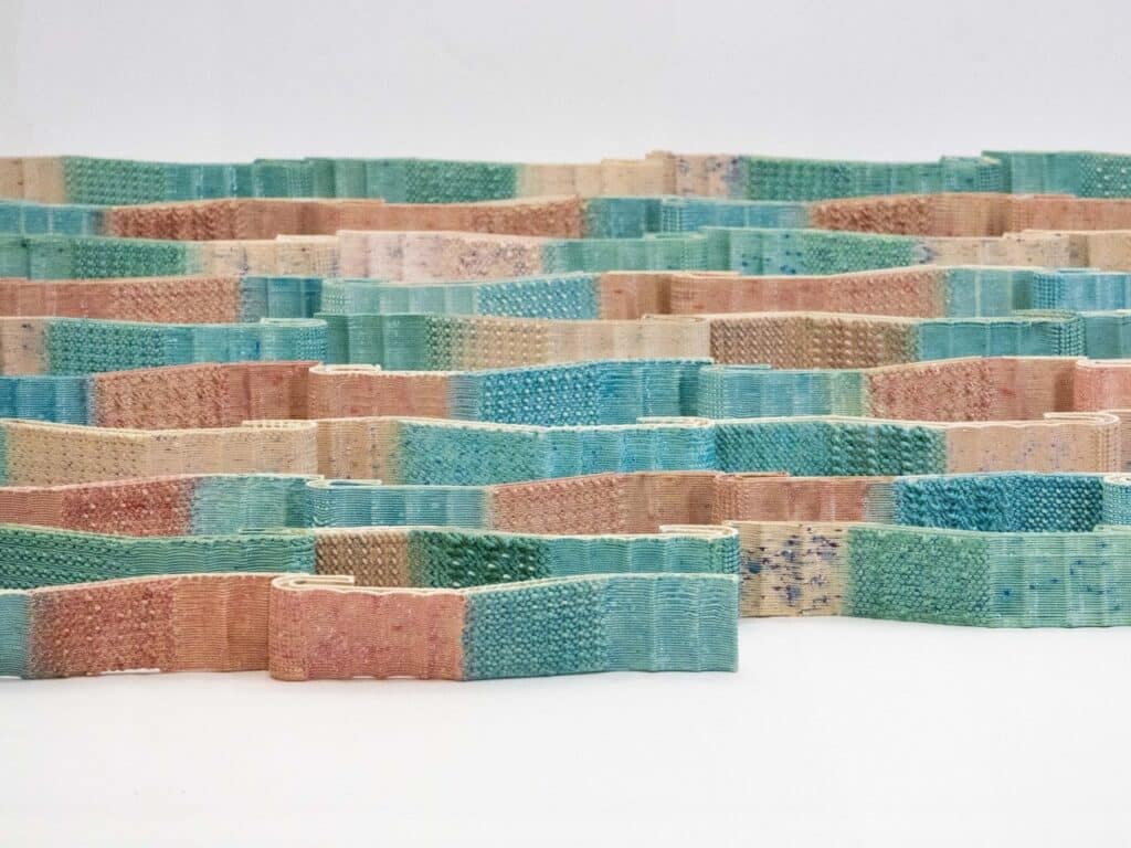 3D-printed CeraShingle ceramic panels on the building fa&ccedil;ade