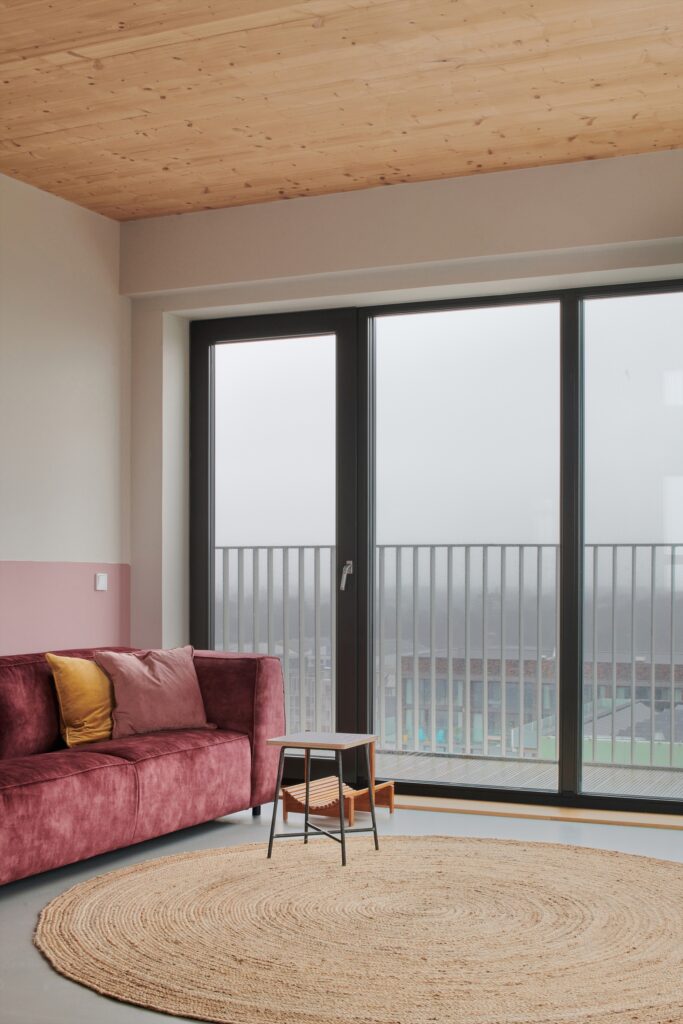 Stories project building in Amsterdam with cross-laminated timber fa&ccedil;ade and vertical greenery