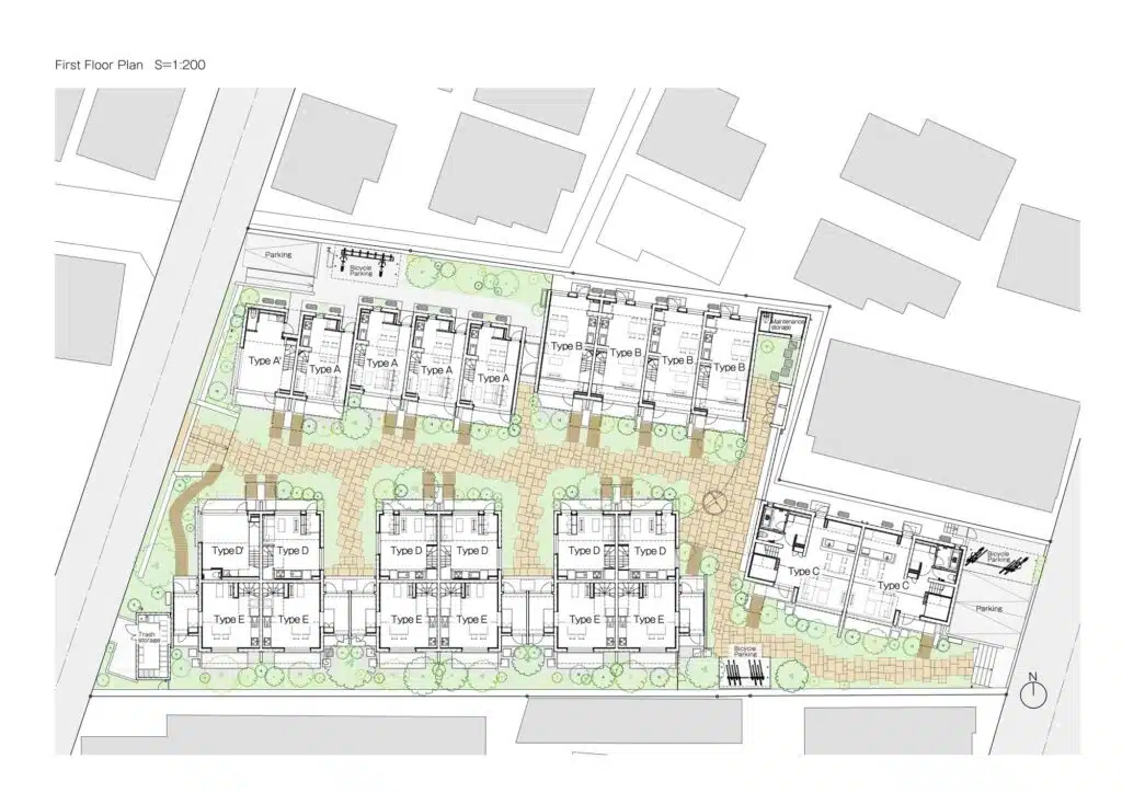 Overview of Nishi-Ogikubo residential cluster showing three-story terraced houses and narrow garden paths.