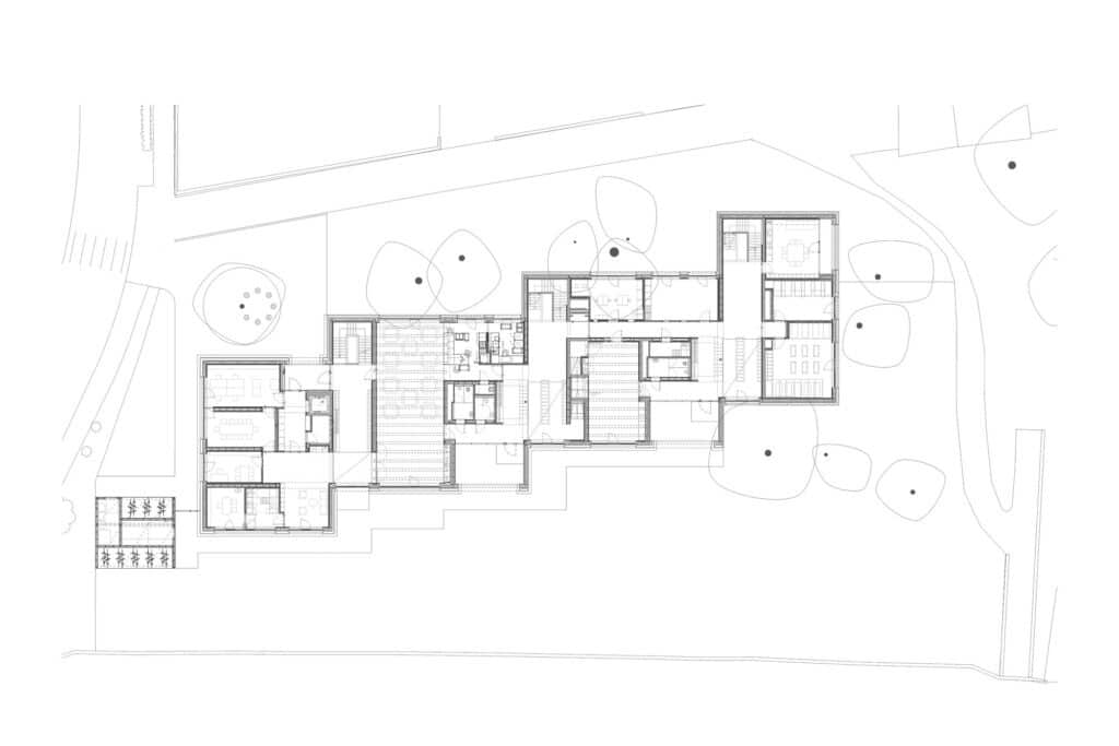 Exterior view of Allesamt Family Center with wooden fa&ccedil;ade near Nenzing train station