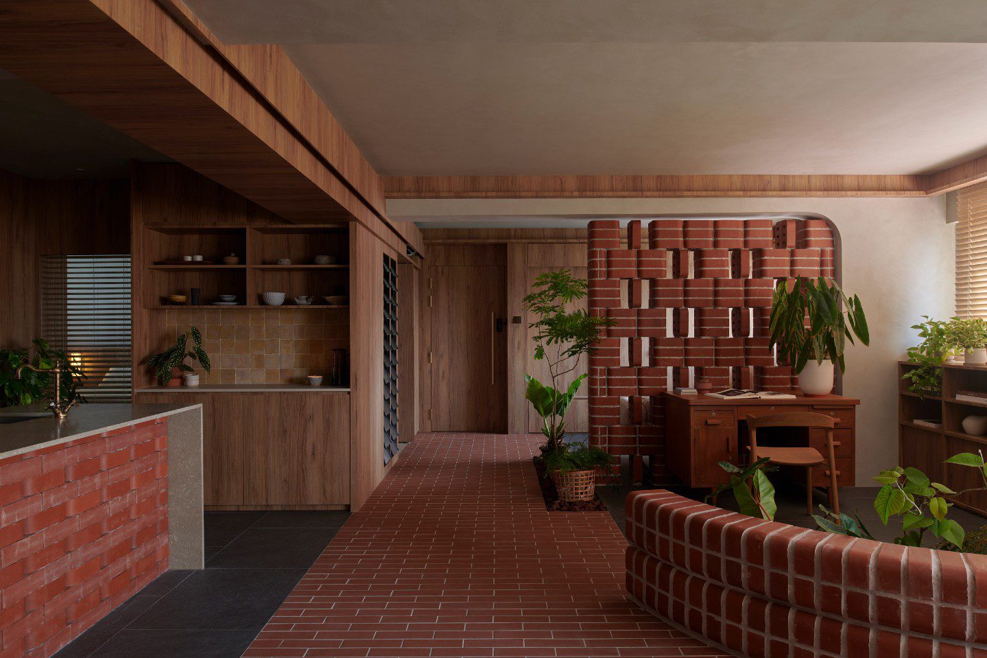 Use of double bullnose bricks in a Singapore flat to integrate nature and living space
