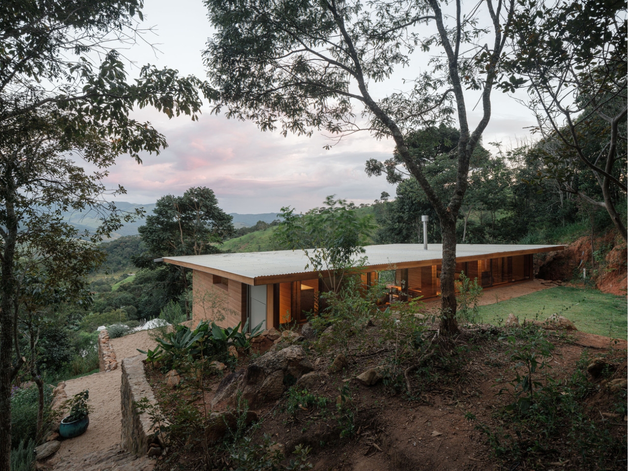 Compressed earth wall in the Piracaia Eco-Village houses, showing the traditional construction technique.