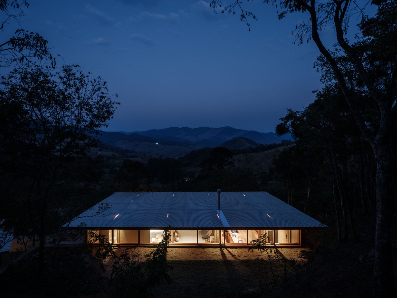 Compressed earth wall in the Piracaia Eco-Village houses, showing the traditional construction technique.