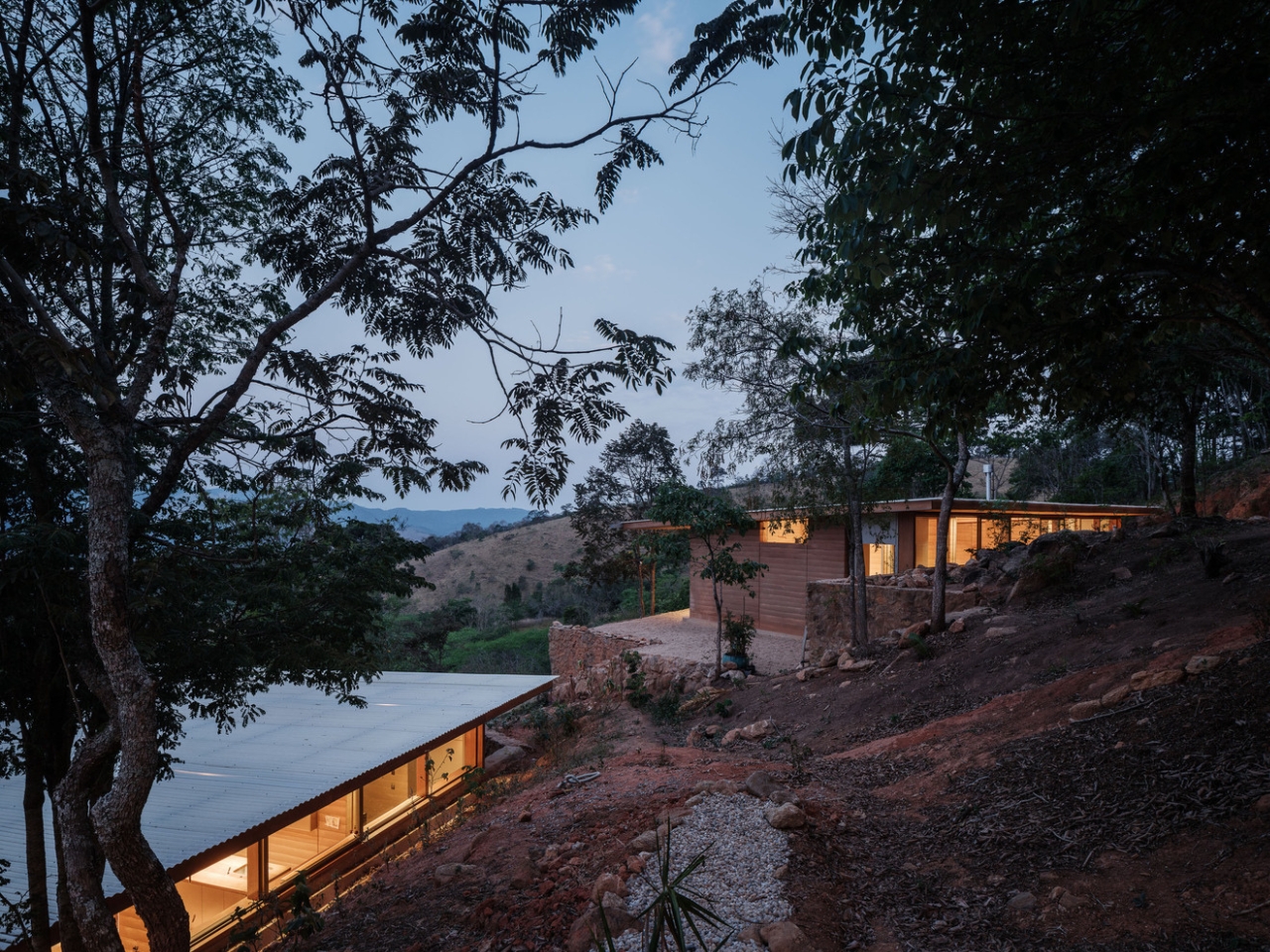 Compressed earth wall in the Piracaia Eco-Village houses, showing the traditional construction technique.