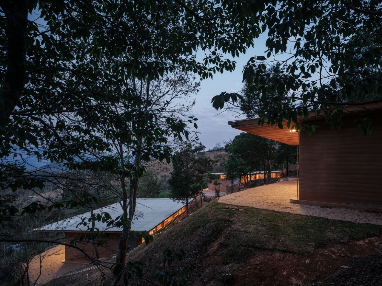 Compressed earth wall in the Piracaia Eco-Village houses, showing the traditional construction technique.