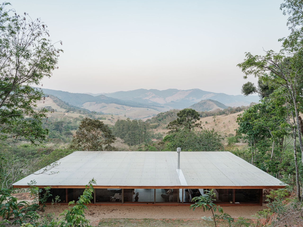 Compressed earth wall in the Piracaia Eco-Village houses, showing the traditional construction technique.