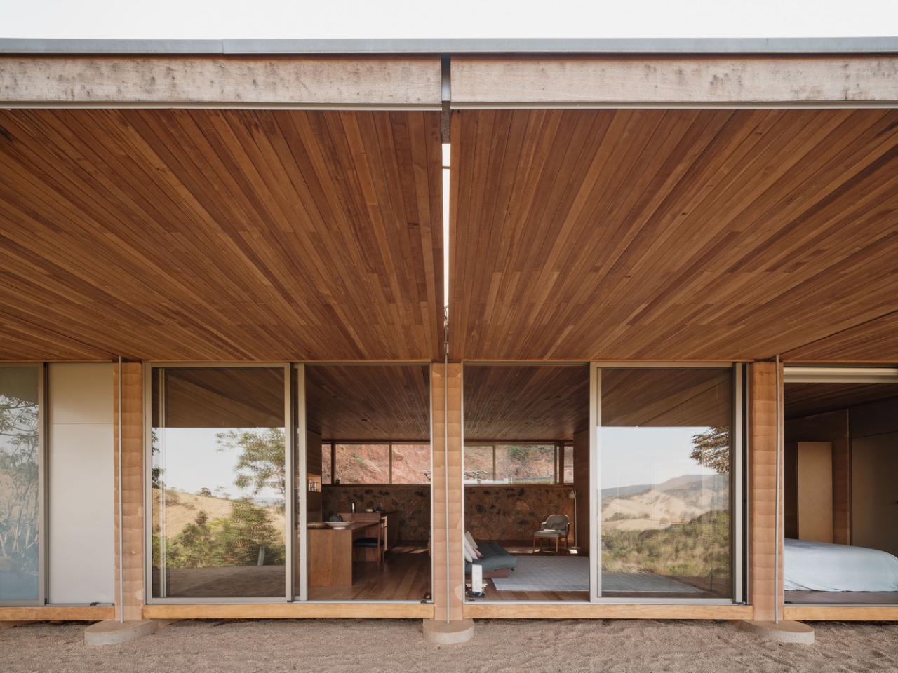 Compressed earth wall in the Piracaia Eco-Village houses, showing the traditional construction technique.