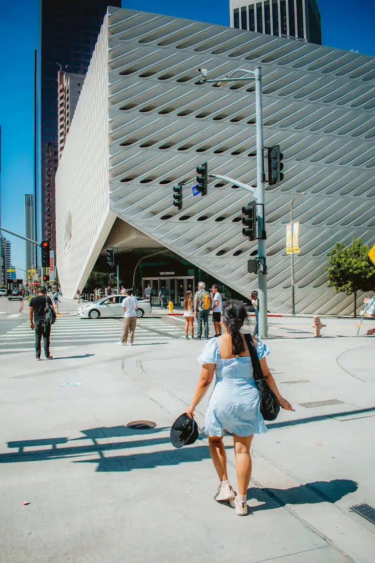 Street scene outside The Broad in Los Angeles, featuring modern architecture and urban lifestyle.