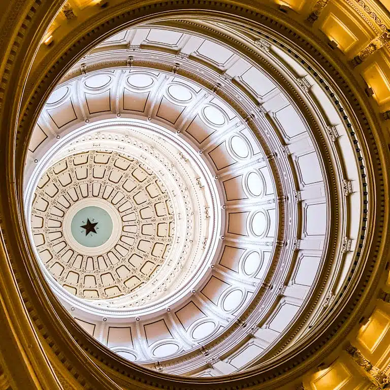Stunning view of the Texas State Capitol dome interior captured from below.