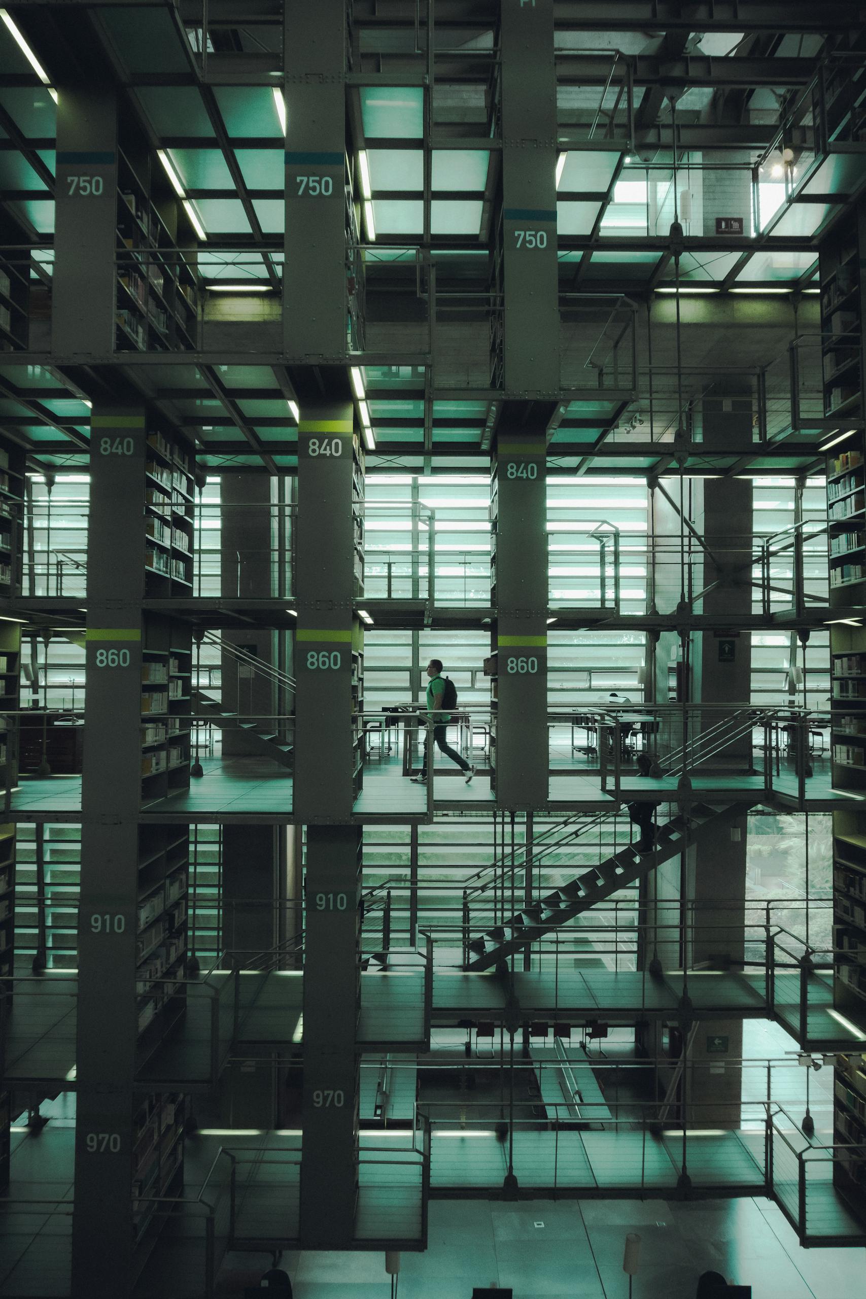Vertical shot capturing the modern interior of a library in Mexico City.
