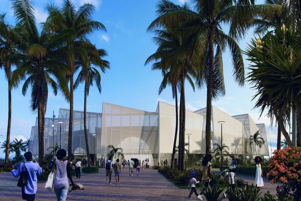 Visitors stroll among palms and a translucent facade glowing with warm shadows