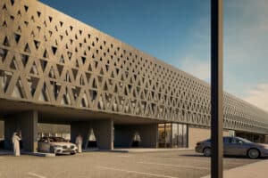Exterior rendering of the House of Nassr Sports Complex in Riyadh, showcasing its geometric concrete facade with triangular cutouts and ground-level entrance under a cantilevered structure.