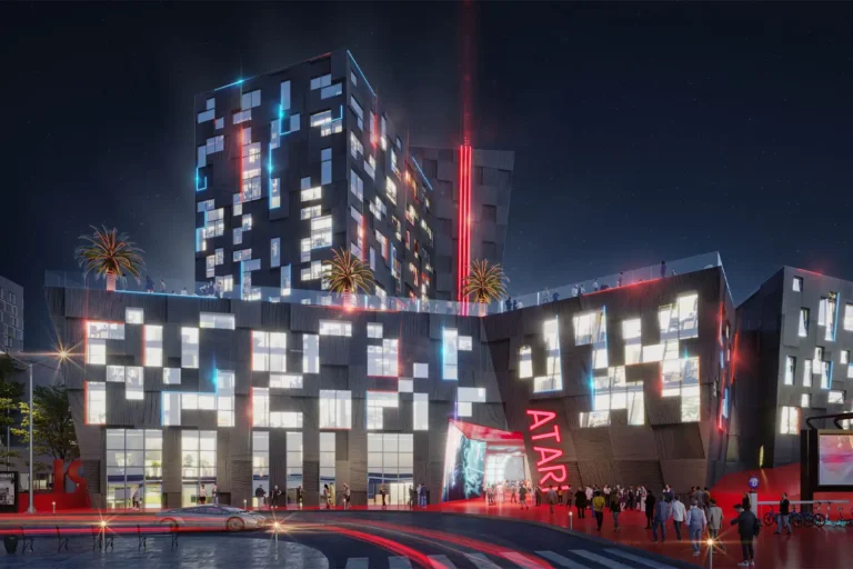 Nighttime rendering of the in Phoenix, featuring a pixelated facade with dynamic red and blue LED lighting, rooftop palm trees, and a glowing ATARI sign at the entrance.