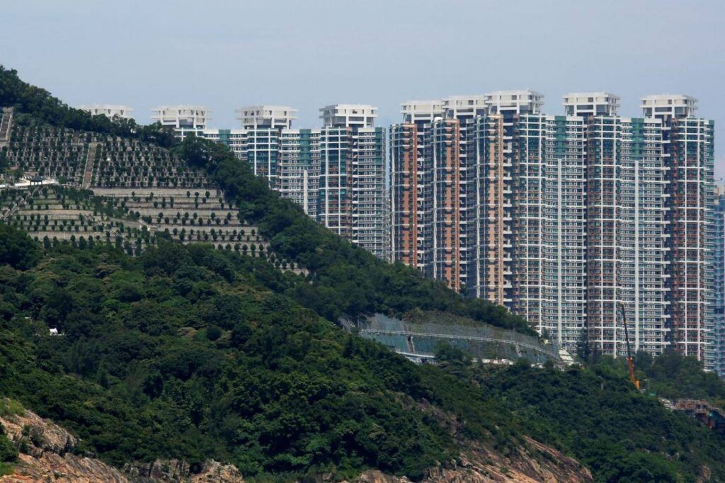 The floating horizontal structure of Vanke Center in Shenzhen designed by Steven Holl Architects, representing the scale of the real estate giant.