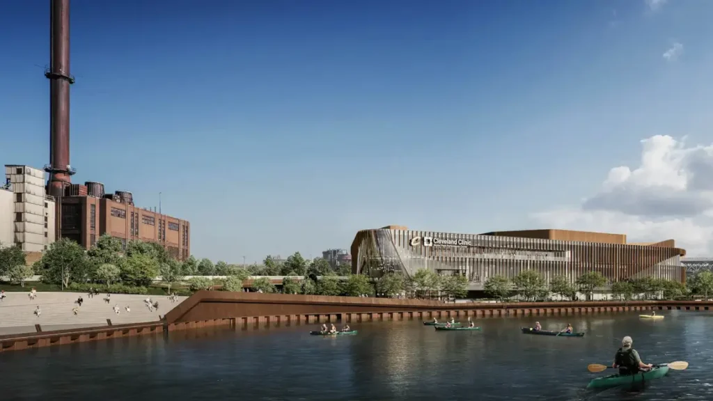 إطلالة من النهر تُظهر انسجام المبنى الجديد مع الطابع الصناعي للمنطقة المحيطة.