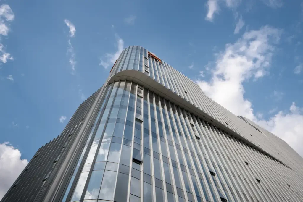 Curved corners mirror the sky, light gradients create a dynamic, upward motion.