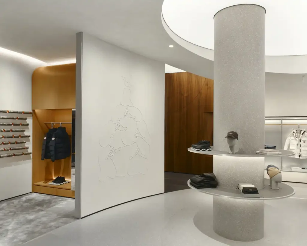 Lighting gradient between the warm wood section and the curved white column with embossed mapping.