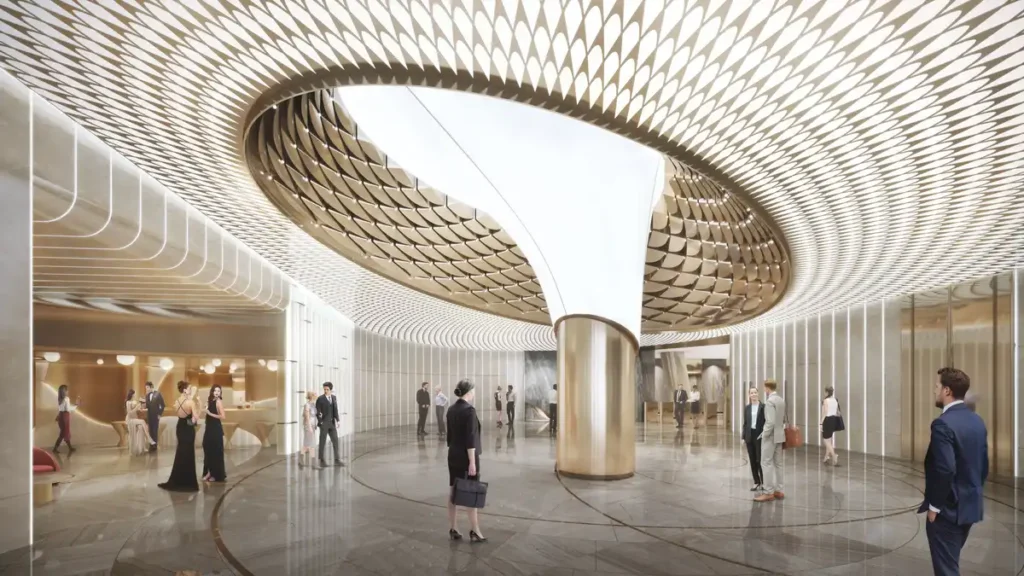 Rendered view of a spacious, modern office tower lobby with a large, curved, patterned ceiling feature, polished floors, and people in business attire walking and conversing.