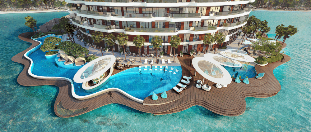 لقطة مقربة لمرفق واجهة مائية تابع لمبنى منتجع، تعرض منطقة سباحة واستراحة مصممة بإبداع على سطح خشبي مرتفع يمتد داخل البحيرة الفيروزية تطوير دانة باي.