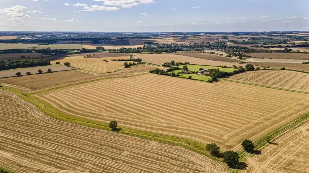 Aerial view of agricultural land in west Suffolk, UK, between Newmarket and Haverhill, east of Cambridge &mdash; the proposed site for the Forest City development.