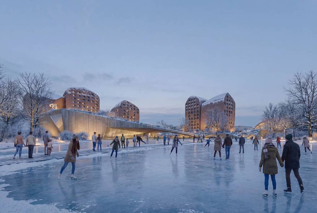 A winter evening scene at the Eastern Gate Polycenter in Almaty, showing an ice skating rink with visitors and illuminated sculptural buildings against a snow-covered landscape.