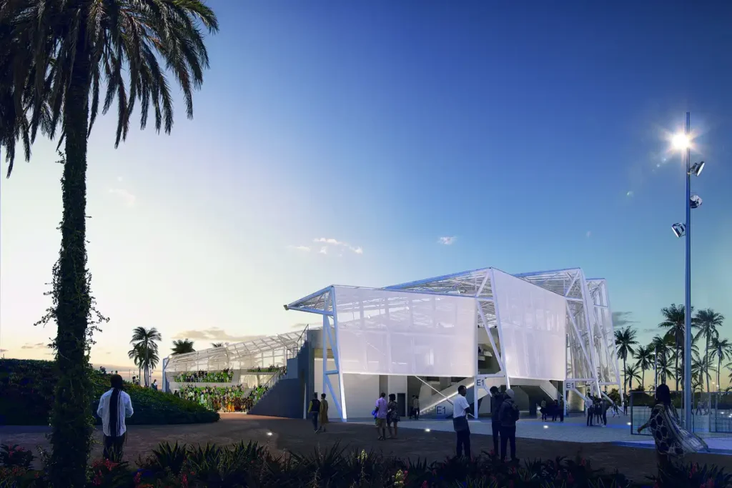 White steel frames gleam at dusk, with palm shadows guiding visitors