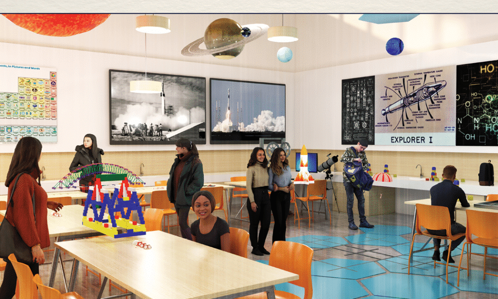 Students building science models in a vibrant lab with natural light and celestial ceiling decor.